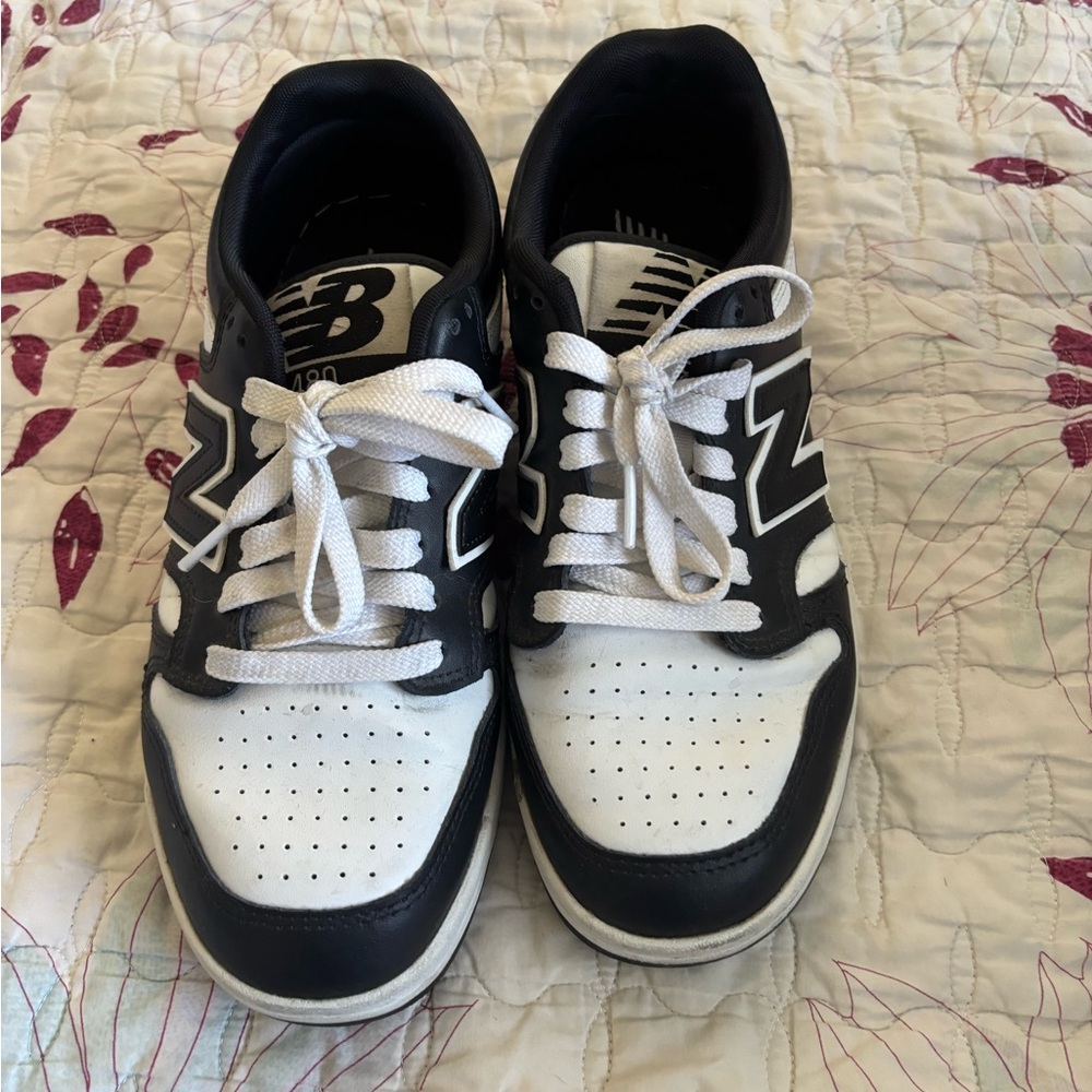 New Balance Men's Black and White Sneakers